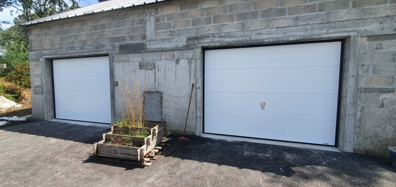 Pose de portes de garage au sein d'une résidence collective